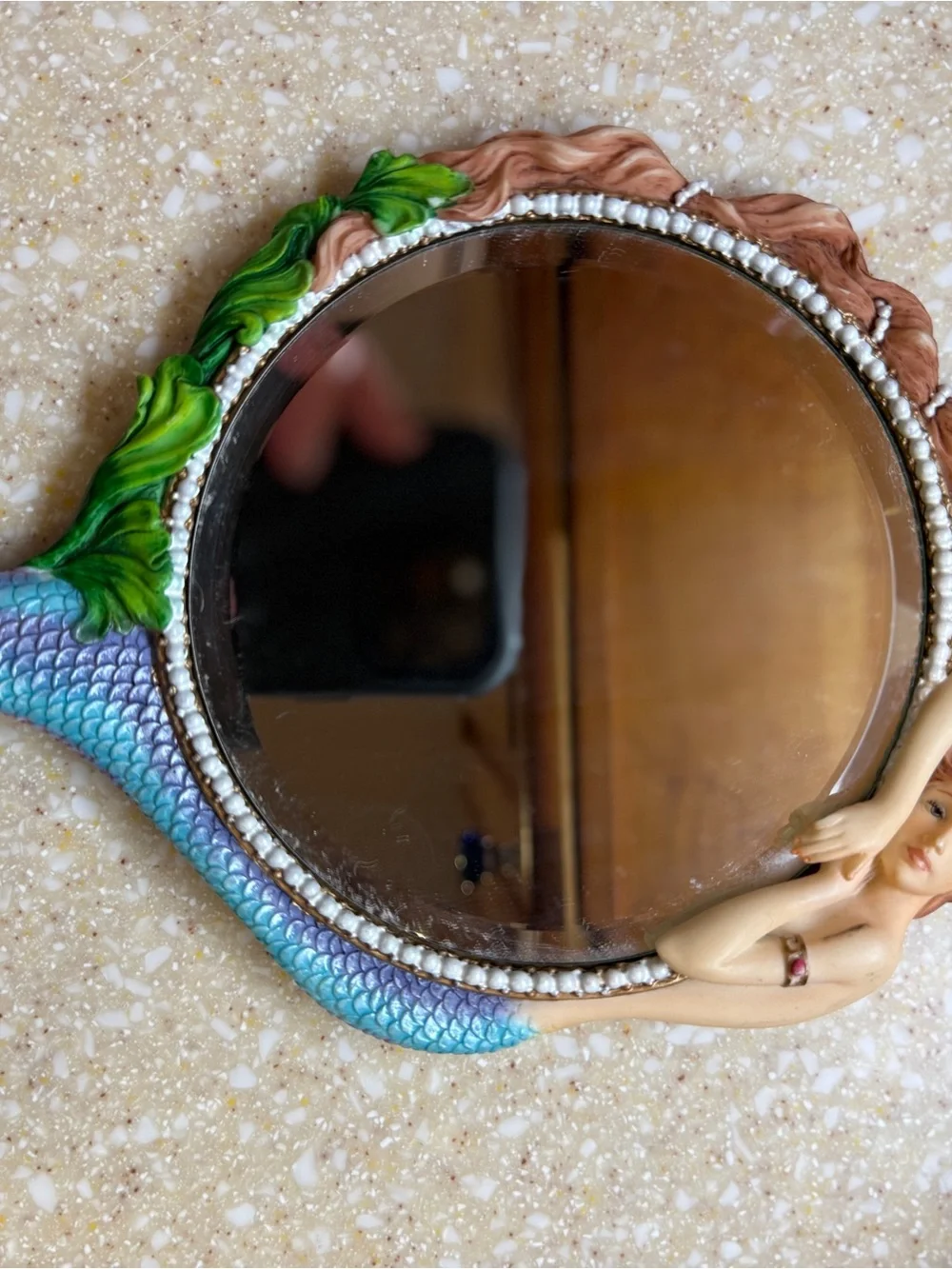 Mermaid Scale Hand Mirror with Green Leaf Accents